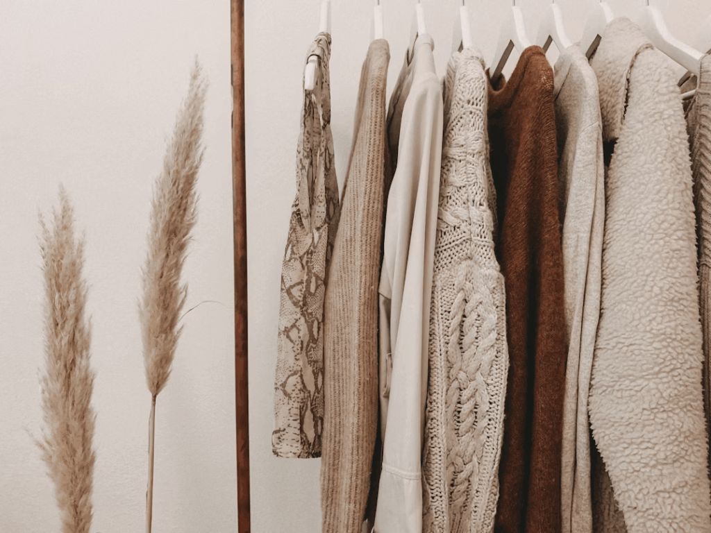 Neutral capsule wardrobe with versatile, timeless clothing pieces for sustainable fashion and cost savings